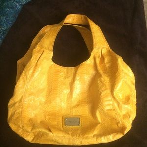 Bright yellow Nine West faux snake skin purse
